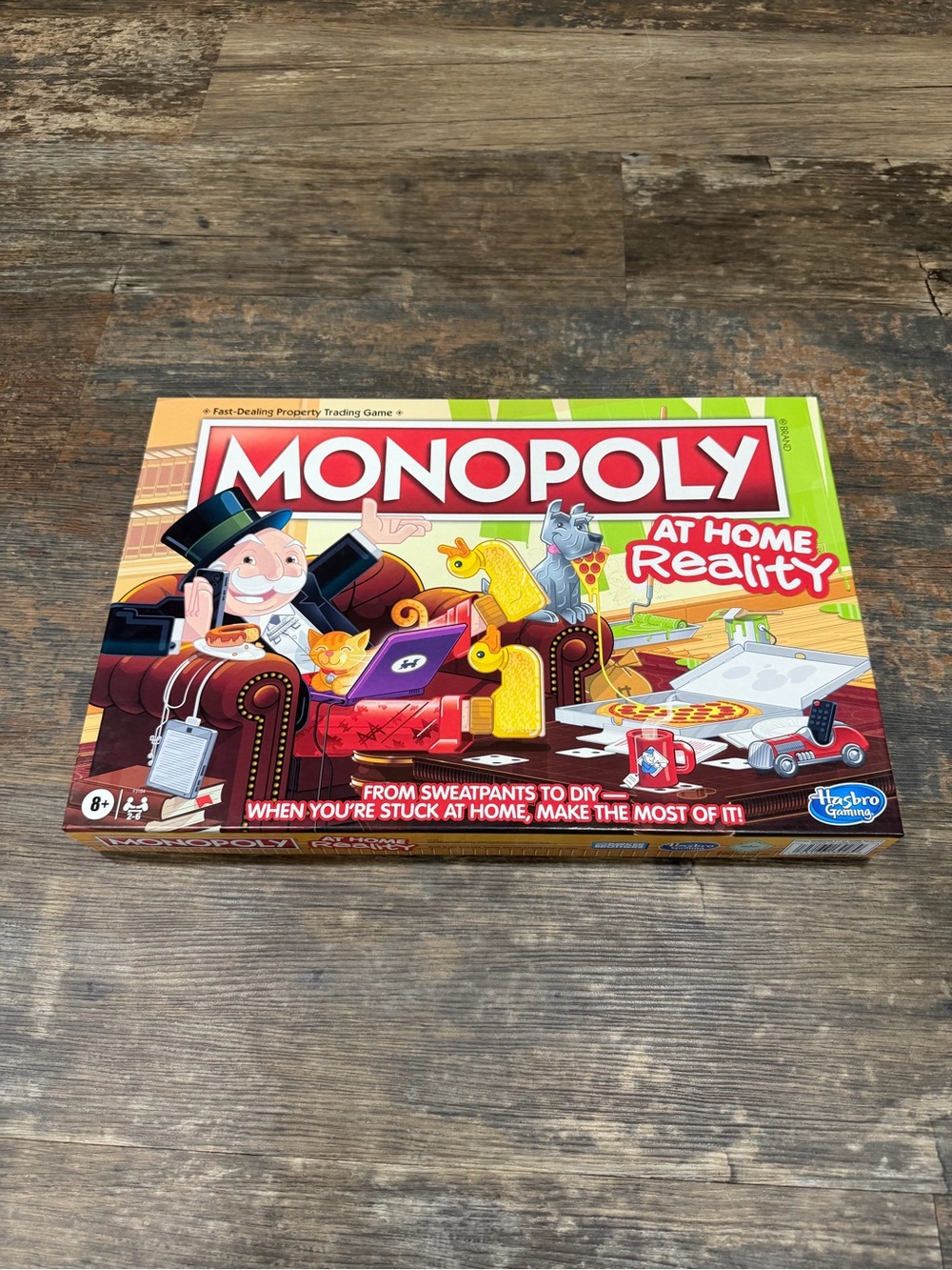 Monopoly At Home Reality Board Game - Red/Green Box by Hasbro